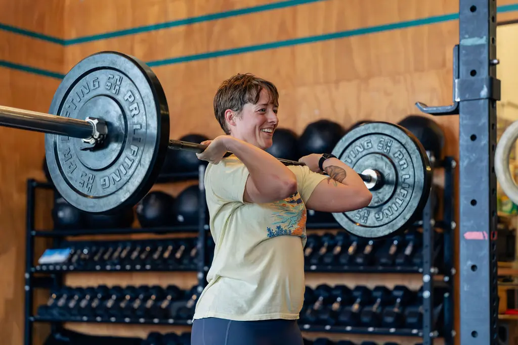 Polaris Strength & Conditioning members gathered together inside the Seattle gym